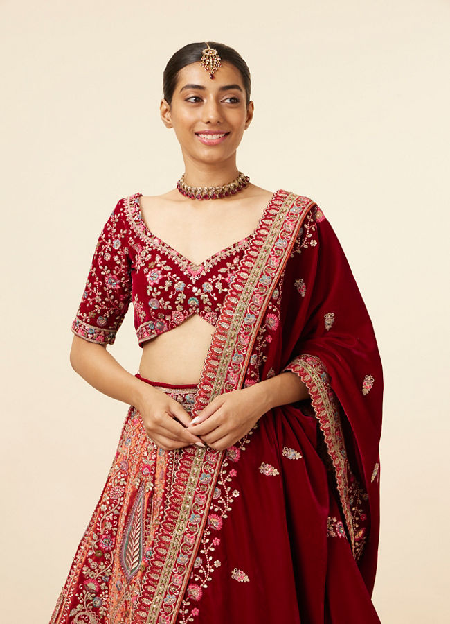 alt message - Mohey Women Mustard Red Embroidered Bridal Lehenga image number 1